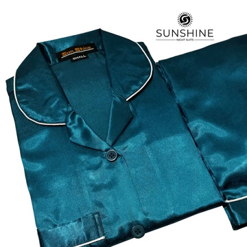 Purchase Teal Silk Pajamas for Women Online at MaaRss. Explore our collection of premium black silk pajamas tailored for women. This set includes a stylish button-down long-sleeve top and relaxed-fit pants. Elevate your sleepwear with these luxurious and