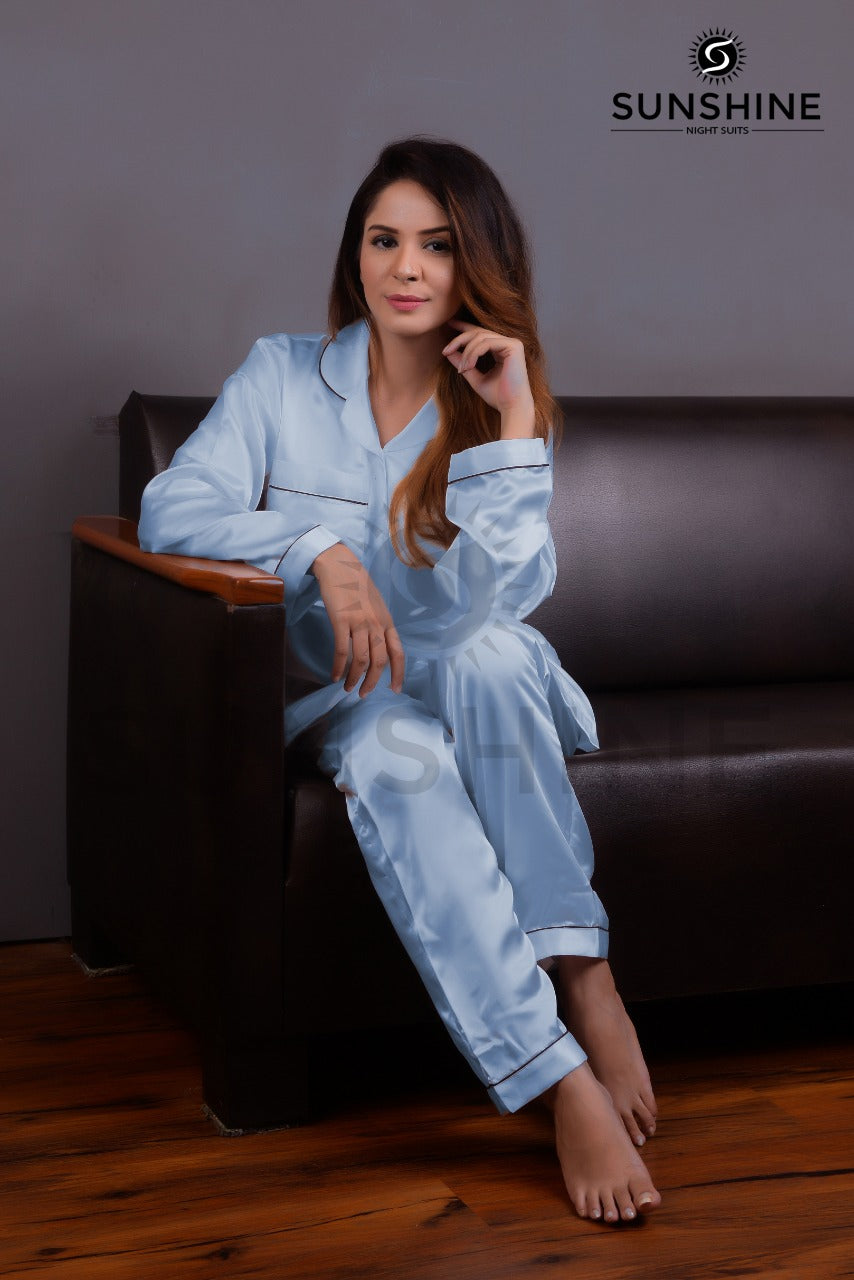 Purchase Sky Blue Silk Pajamas for Women Online at MaaRss. Explore our collection of premium black silk pajamas tailored for women. This set includes a stylish button-down long-sleeve top and relaxed-fit pants. Elevate your sleepwear with these luxurious 