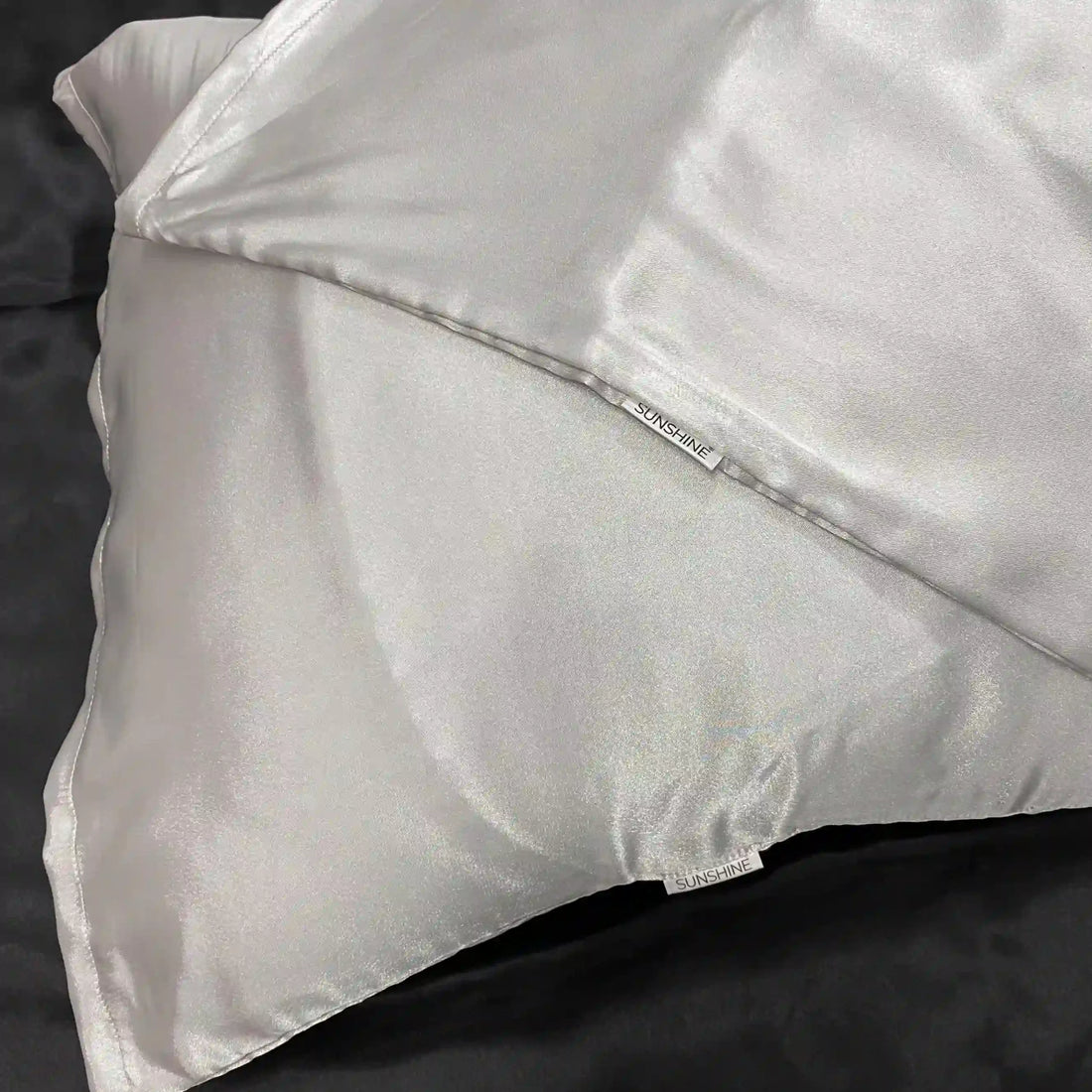 Luxurious White silk satin pillowcases with a glossy, elegant finish