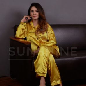 Purchase Golden Silk Pajamas for Women Online at MaaRss.Explore our collection of premium black silk pajamas tailored for women. This set includes a stylish button-down long-sleeve top and relaxed-fit pants. Elevate your sleepwear with these luxurious and comfortable pajamas, perfect for a restful night's sleep.