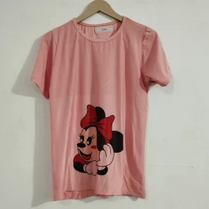 A woman wearing Mickey Mouse T-shirt Pajama Set, showcasing the iconic Mickey design.